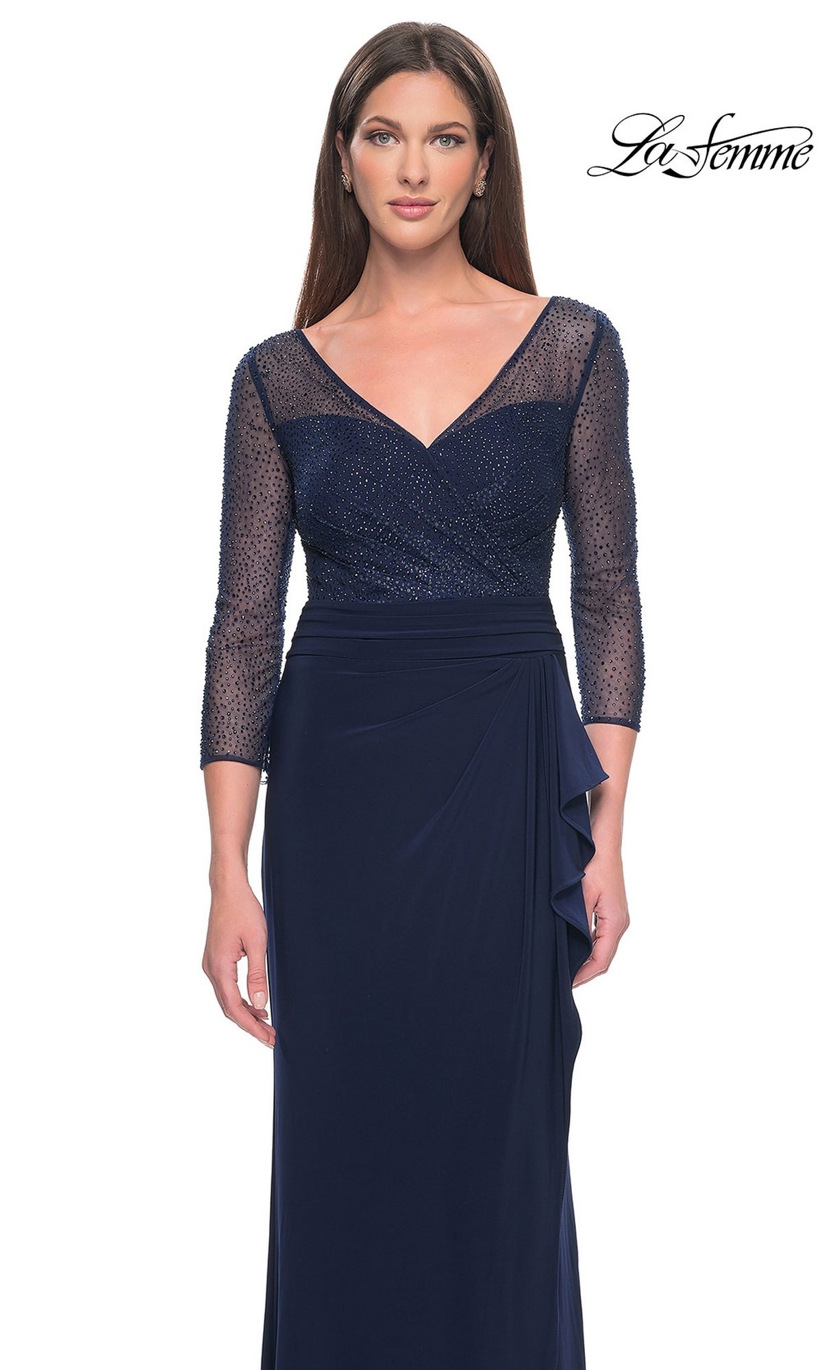 La Femme 31777 is a navy blue, floor-length modest formal dress with a V-neckline, sheer three-quarter sleeves, and a beaded bodice.
